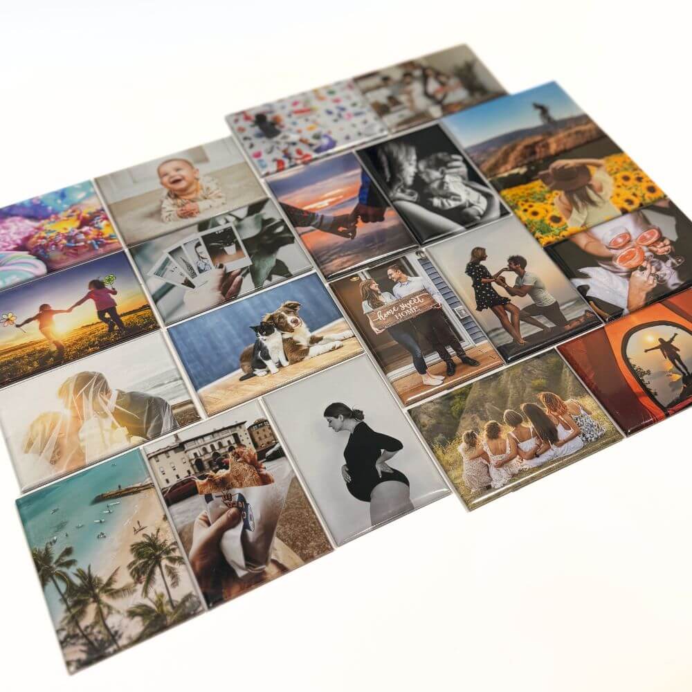 Image shows a flat lay of a set of 20 rectangle photo magnets. Each magnet with a different image on them showcasing the versatility in what photo could be utilised. 