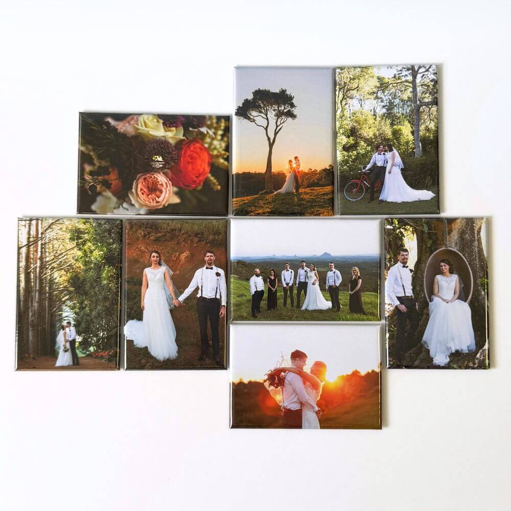Image shows a flat lay of eight rectangle photo magnets displaying images from a wedding. 
